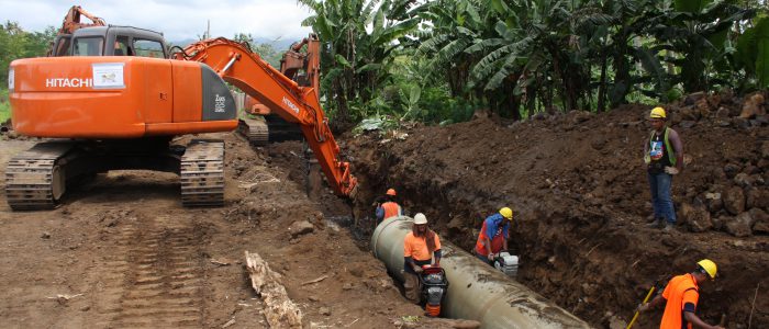 MAP Projects workers installing piping