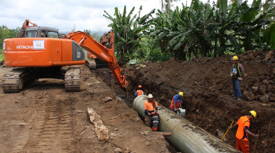 MAP Projects workers installing piping